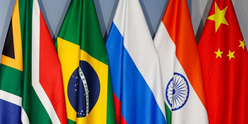 (FILES) A general view of flags of (From L to R) South Africa, Brazil, Russia, India and China during the 2023 BRICS Summit at the Sandton Convention Centre in Johannesburg on August 24, 2023. South Africa will on November 21, 2023 host a virtual summit of the BRICS group of nations, including Russian President Vladimir Putin, to discuss the Israel-Hamas war, Pretoria and Moscow said on November 20, 2023.
The BRICS --  Brazil, Russia, India, China and South Africa -- are a group of major emerging economies seeking to reshape the US and Western-led global order. (Photo by Marco Longari / AFP)